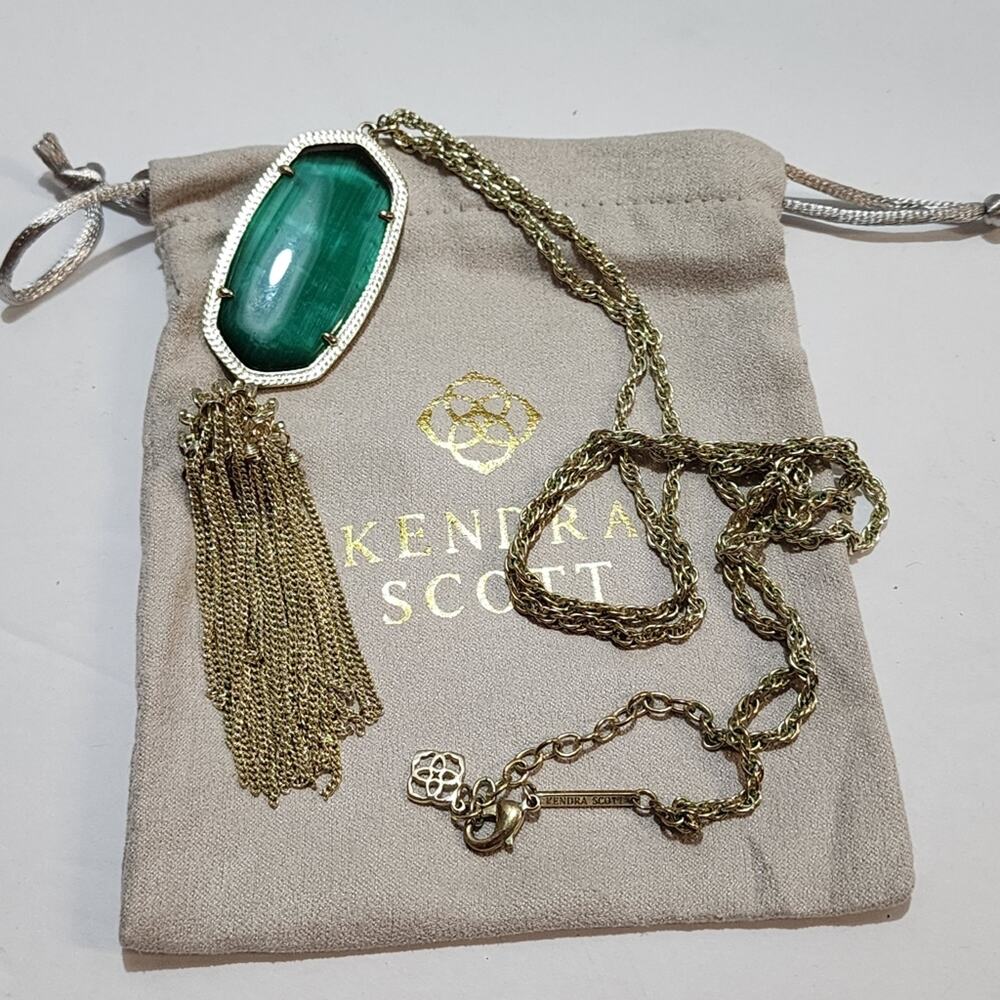 Kendra Scott gold and London Blue? Rayne necklace
